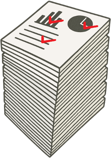 積み上がった校正紙の山